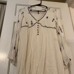 Cream and black tunic dress